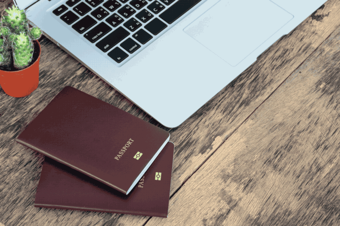 A Laptop And Passports