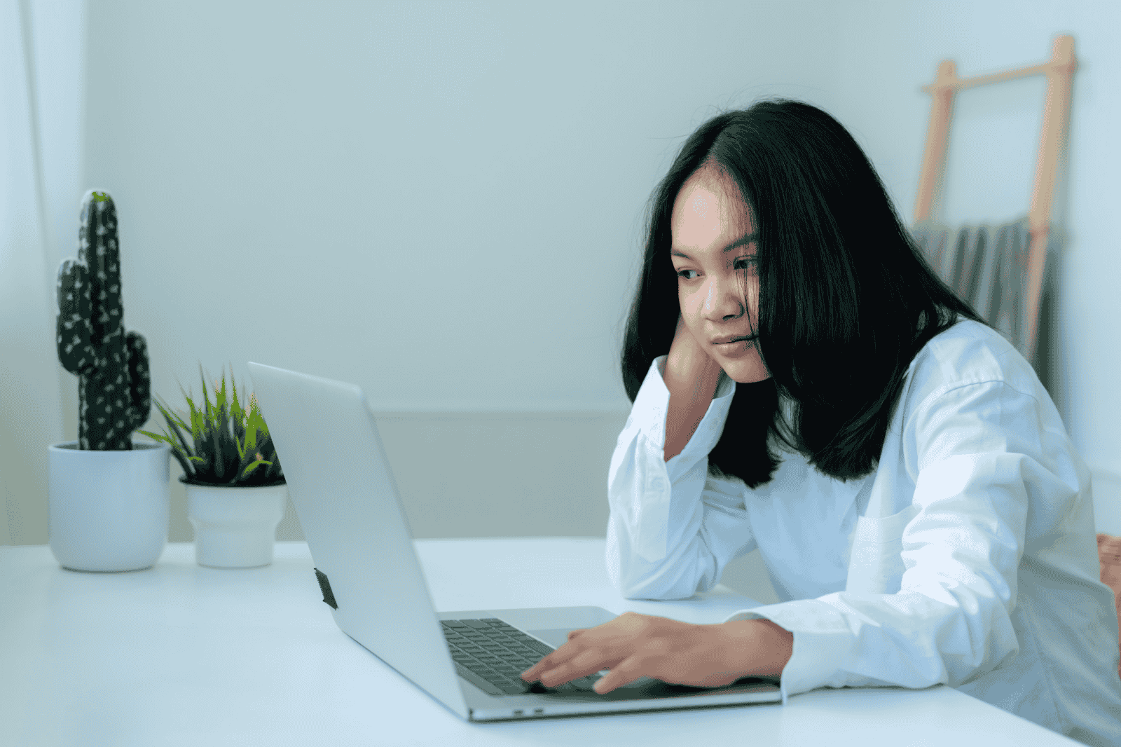 A Woman Using A Laptop